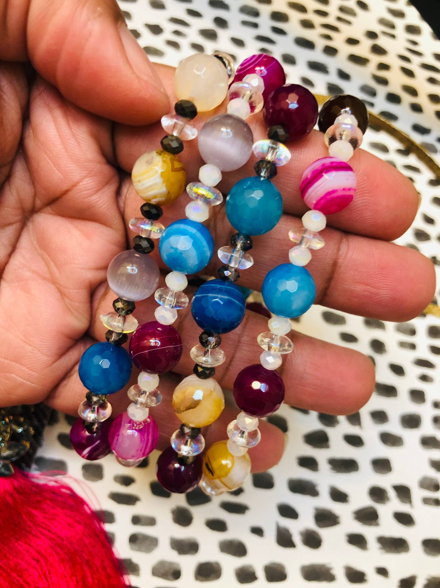 Handmade beaded bracelets in gemstone colors