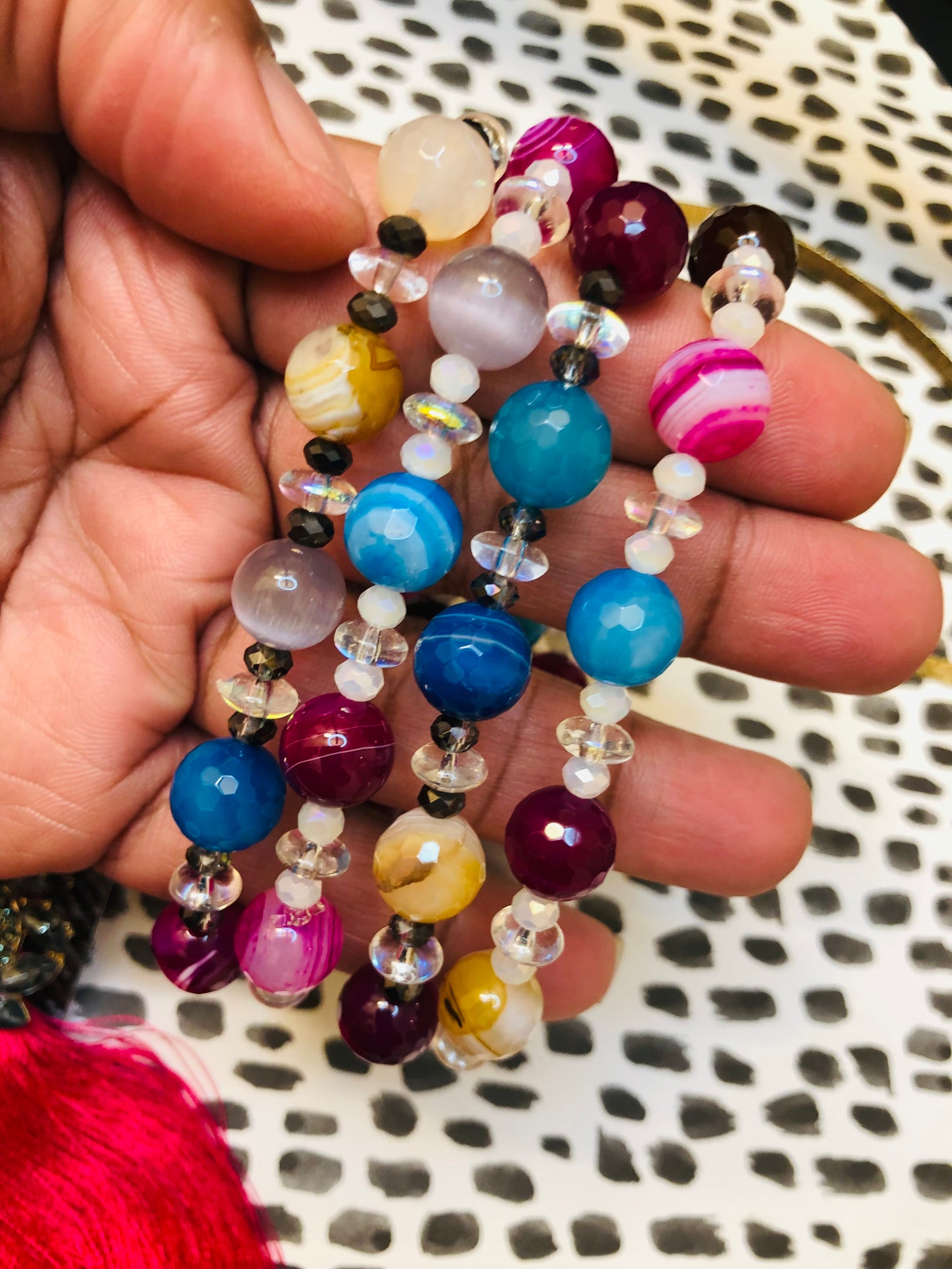 Handmade beaded bracelets in gemstone colors